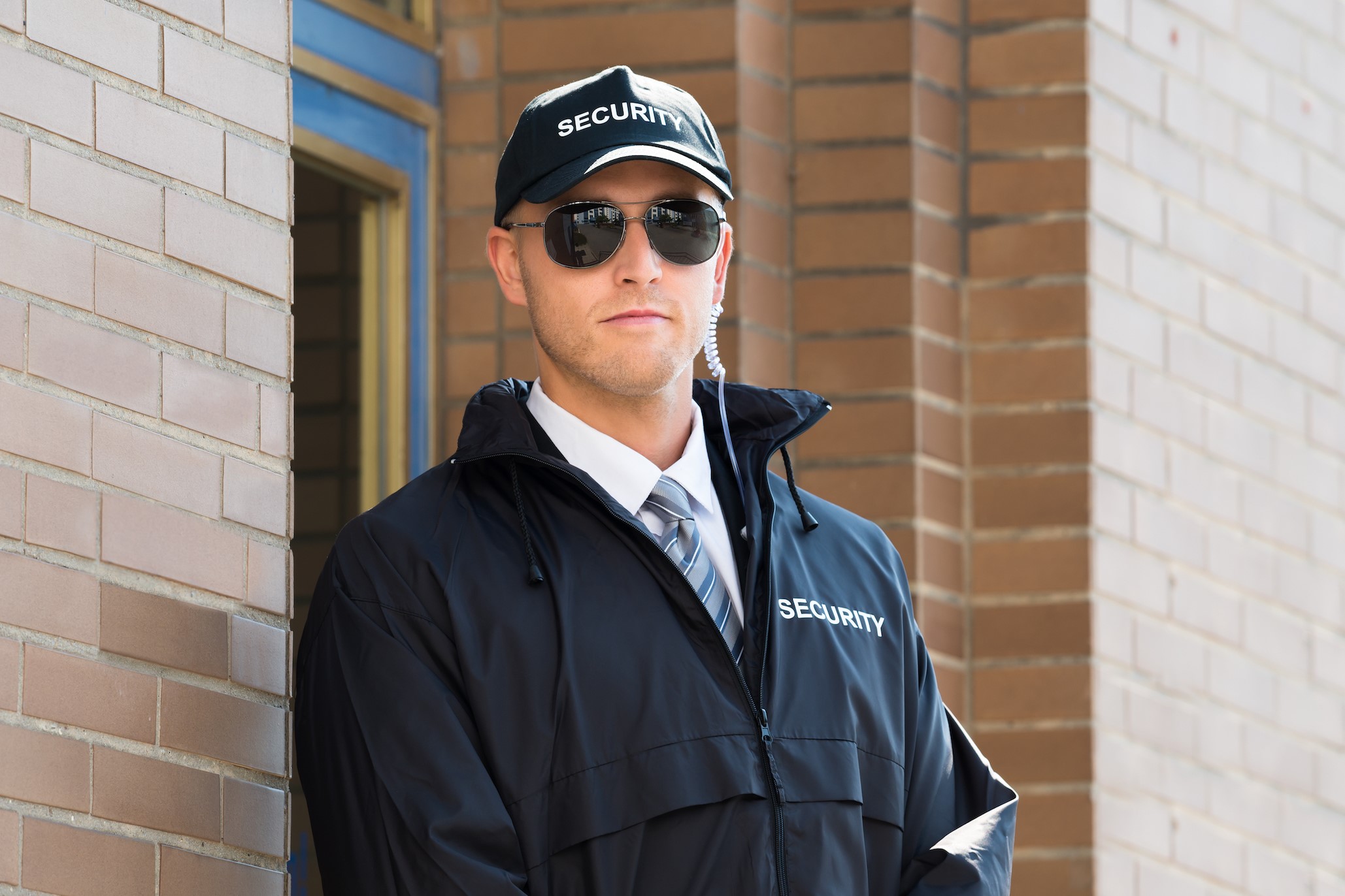 Diplomatic Security Agent Standing Outside Building