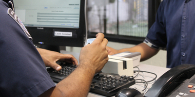 immigration officer reviewing passports