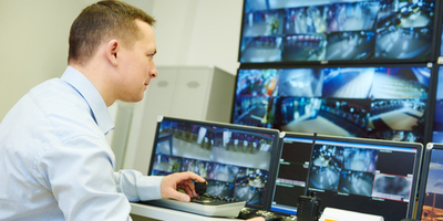 security officer managing video surveillance