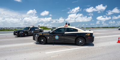 two state troopers involved in a road block